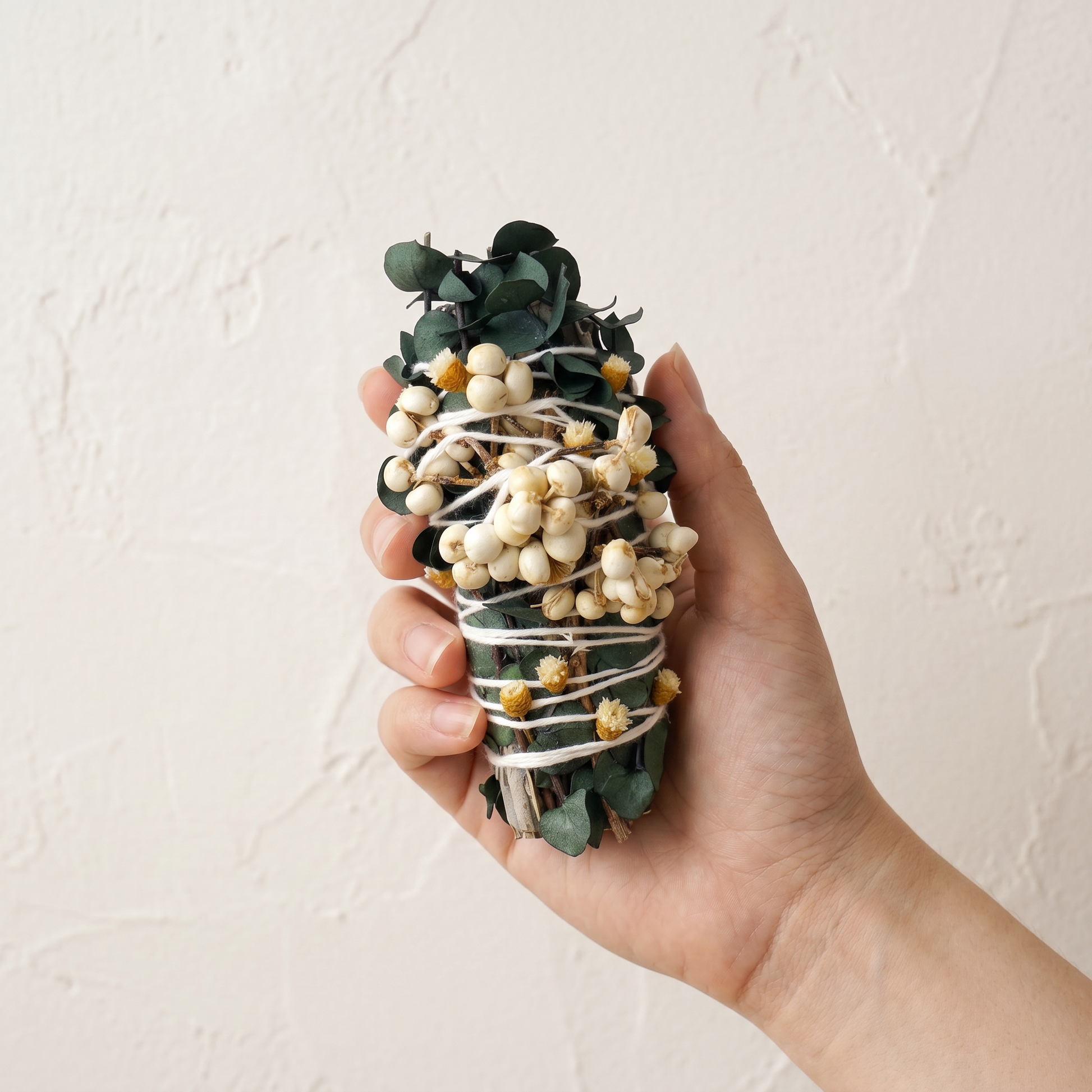 White Sage & Copal Smudge Stick | Eucalyptus & Tallow Berries | Hand Holding Smudge Stick | Sunsum®